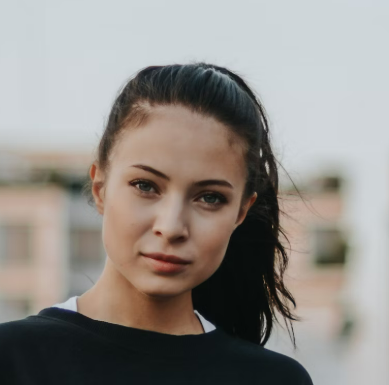 Woman with ponytail outdoors